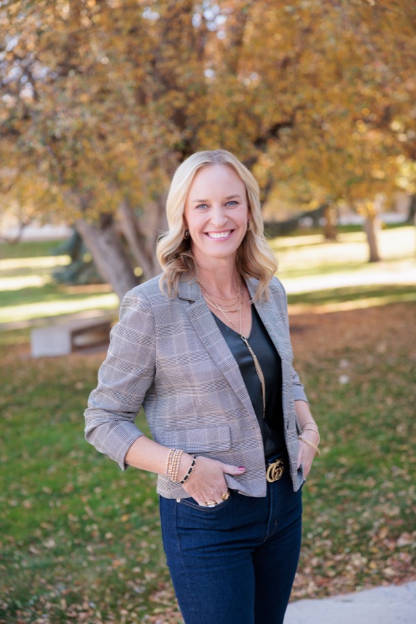 Tisha Taylor walking through a Golden park
